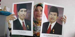 Foto Resmi Jokowi-JK Versi Tersenyum Lebar Kurang Diminati